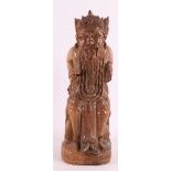 A tropical wooden carved Balinese god, Indonesia, 1st half 20th century.