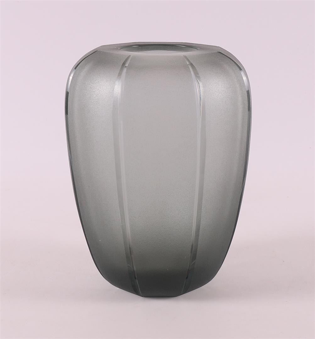 A thick-walled satin-finished clear glass vase with vertical cuts, A.D. Copier