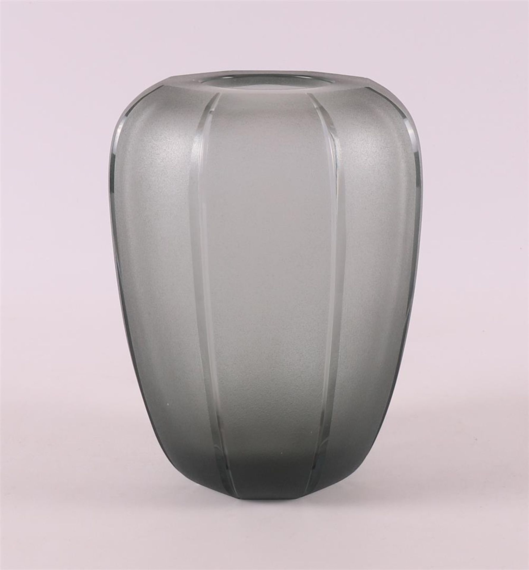 A thick-walled satin-finished clear glass vase with vertical cuts, A.D. Copier