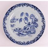 A blue and white porcelain dish with Willow decor, China, Qianlong 18th C.