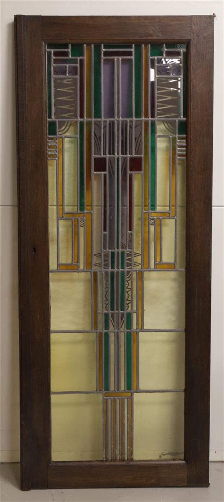 A pair of Amsterdam School stained glass cupboard doors, ca. 1920.