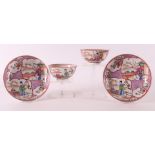 Two porcelain famille rose mandarin cups and saucers, 19th century.