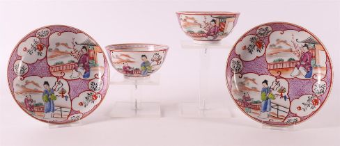 Two porcelain famille rose mandarin cups and saucers, 19th century.