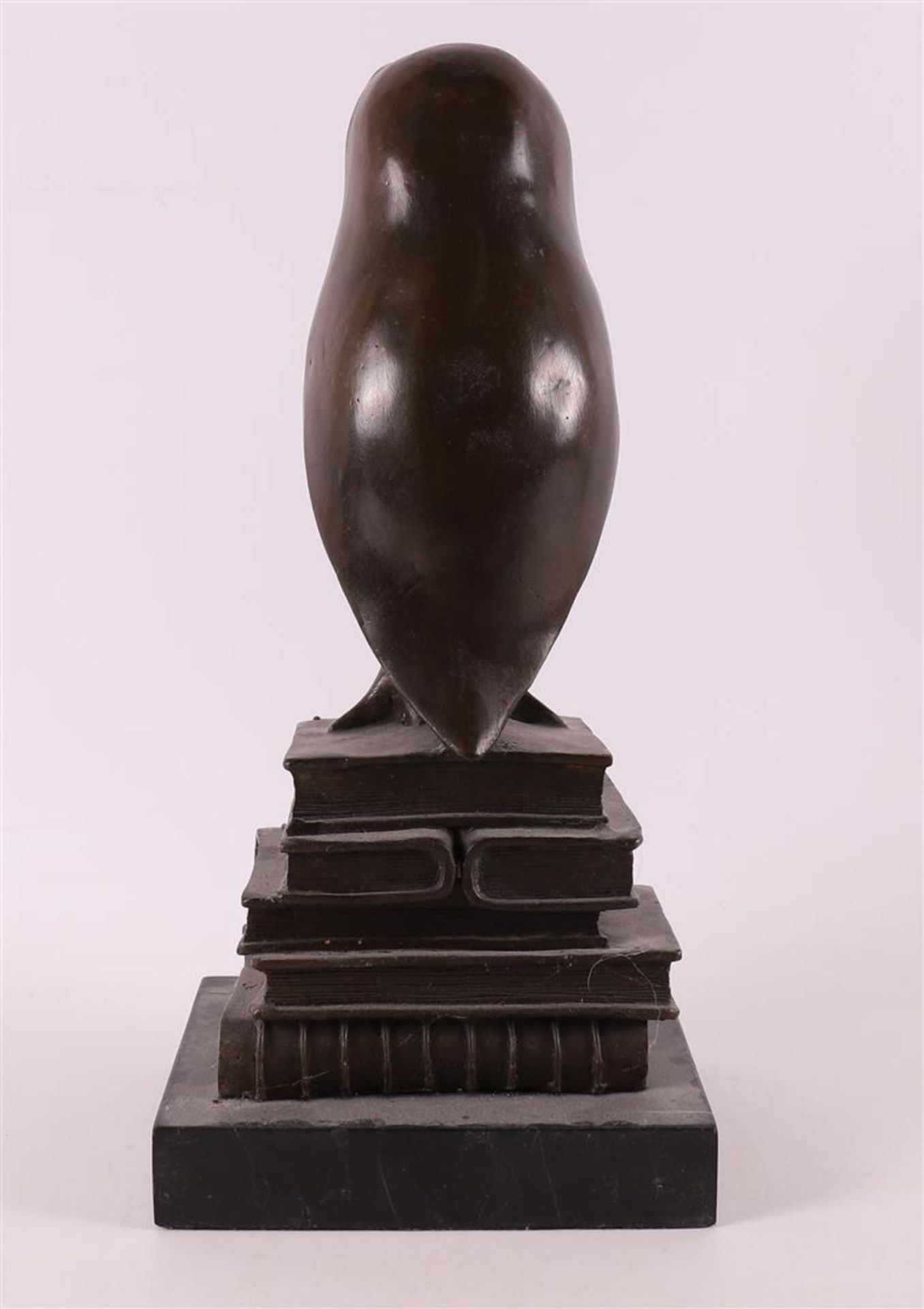 A brown patinated bronze owl sitting on books, Art Deco style. - Image 2 of 5
