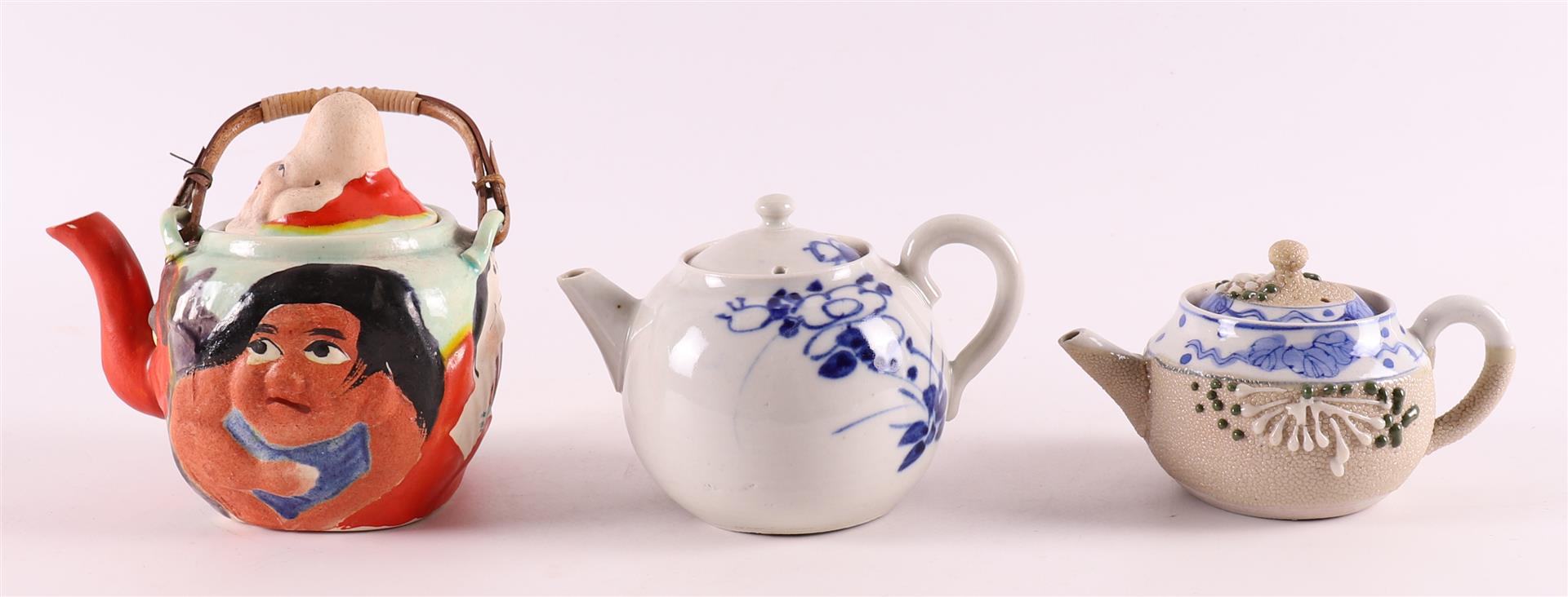 Three various porcelain teapots, Japan, 1st half of the 20th century.