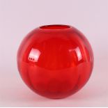 Netherlands, Maastricht. A red spherical glass vase, ca. 1931.