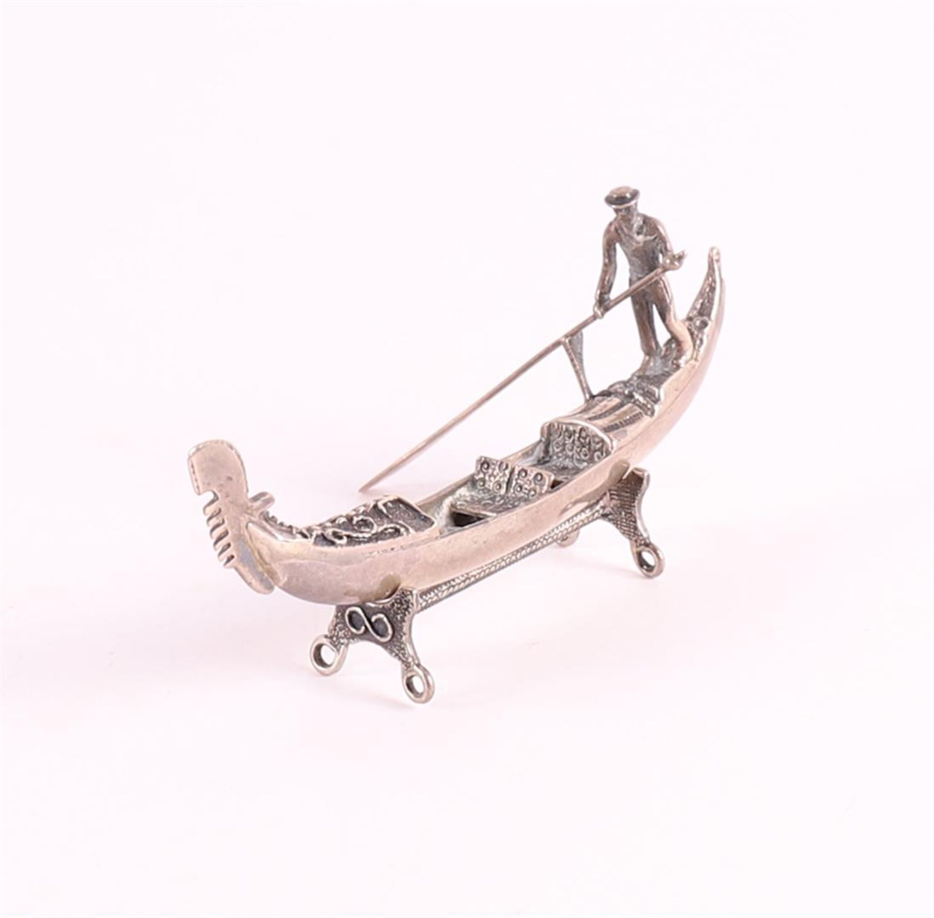 A silver Venetian gondolier with gondola, 20th century.