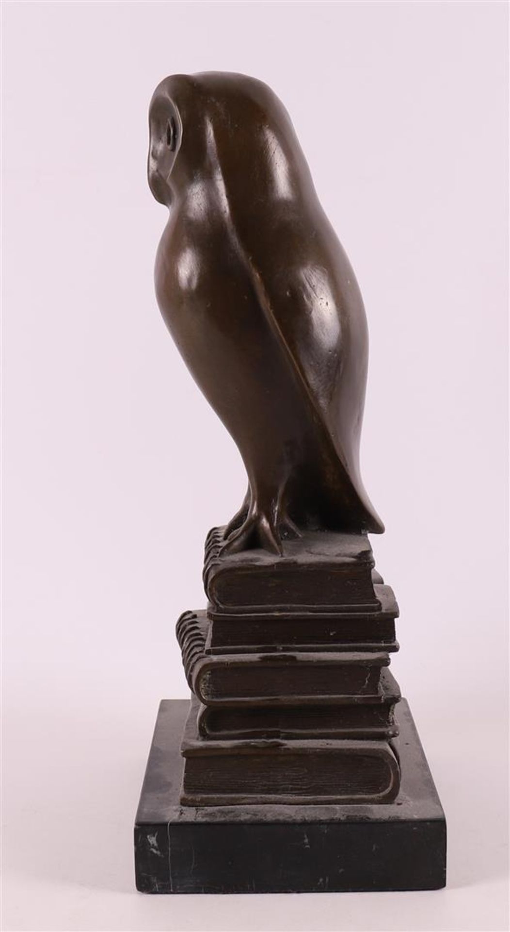 A brown patinated bronze owl sitting on books, Art Deco style. - Image 4 of 5