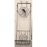 A wrought iron standing coat rack with umbrella stand - France, ca. 1930
