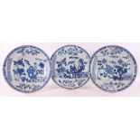 Three blue and white porcelain dishes with capucine rim, China, Qianlong, 18th c