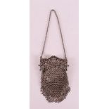 A silver pierced bag handle with chain mail, 19th century