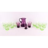 A purple glass water jug with cups 'Dragonfly', design: W.J.Roozendaal 1929