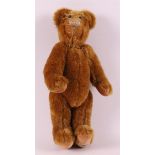 A plush teddy bear, England, House of Nisbet, 1990