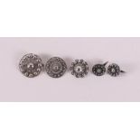 A set of second grade silver cufflinks and three brooches with Zeeland buttons.