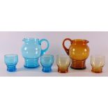 Netherlands, Maastricht. A blue and brown glass water carafe with glasses, ca. 1