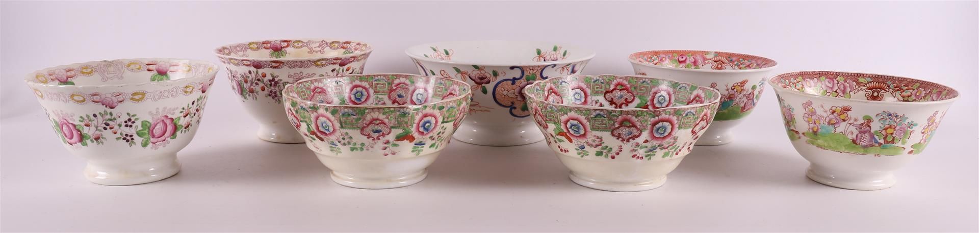 A lot of various earthenware cupboard bowls, including rose bowls, 19th century.