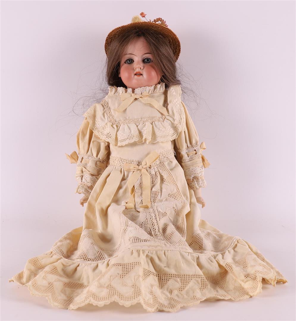 An articulated character doll, Germany, Armand Marseille 370, circa 1900.