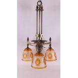 A bronze hanging lamp with satin glass shades, mid 20th century.