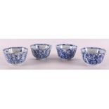 Four Chinese Kangxi style blue and white porcelain cups, 19th century.