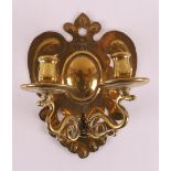 A brass two-light sconce, circa 1800.