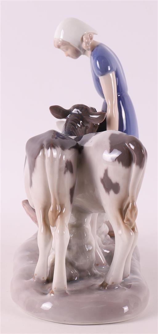 A polychrome porcelain girl with two calves, Denmark, Royal Copenhagen - Image 5 of 6