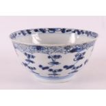 A blue and white porcelain bowl on a stand ring, China, Kangxi, around 1700.