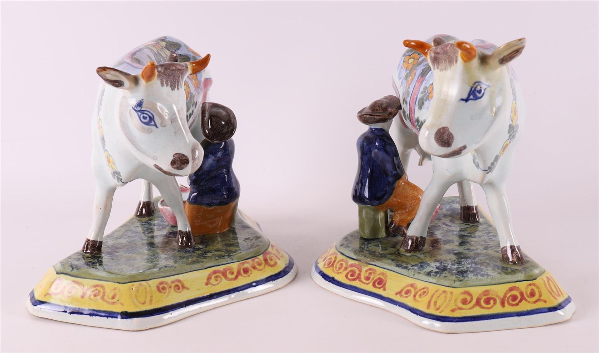 A set of polychrome earthenware cows with milkers, Porselyne bottle / Oud Delft. - Image 2 of 6