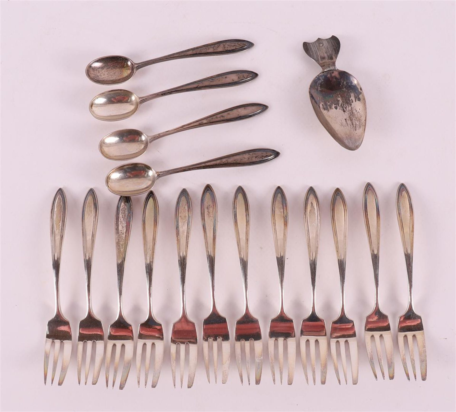 Twelve second grade 835/1000 silver pastry forks, point fillet, 20th century.