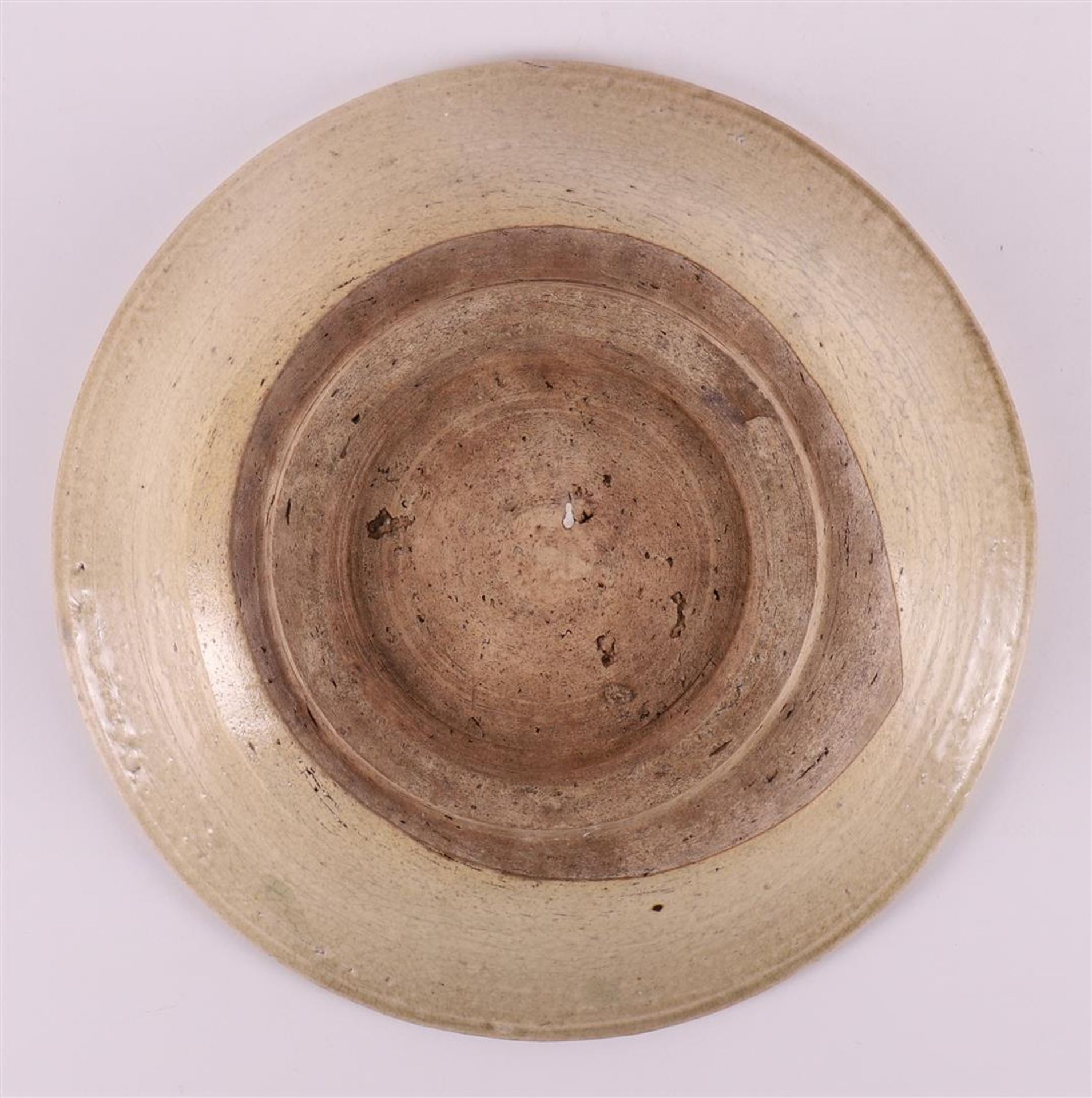 A cream stoneware dish, China/Annam Vietnam, Ming, 15th century. - Image 2 of 2