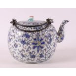 A porcelain teapot, China, circa 1900.