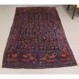 An Oriental carpet, 20th century.