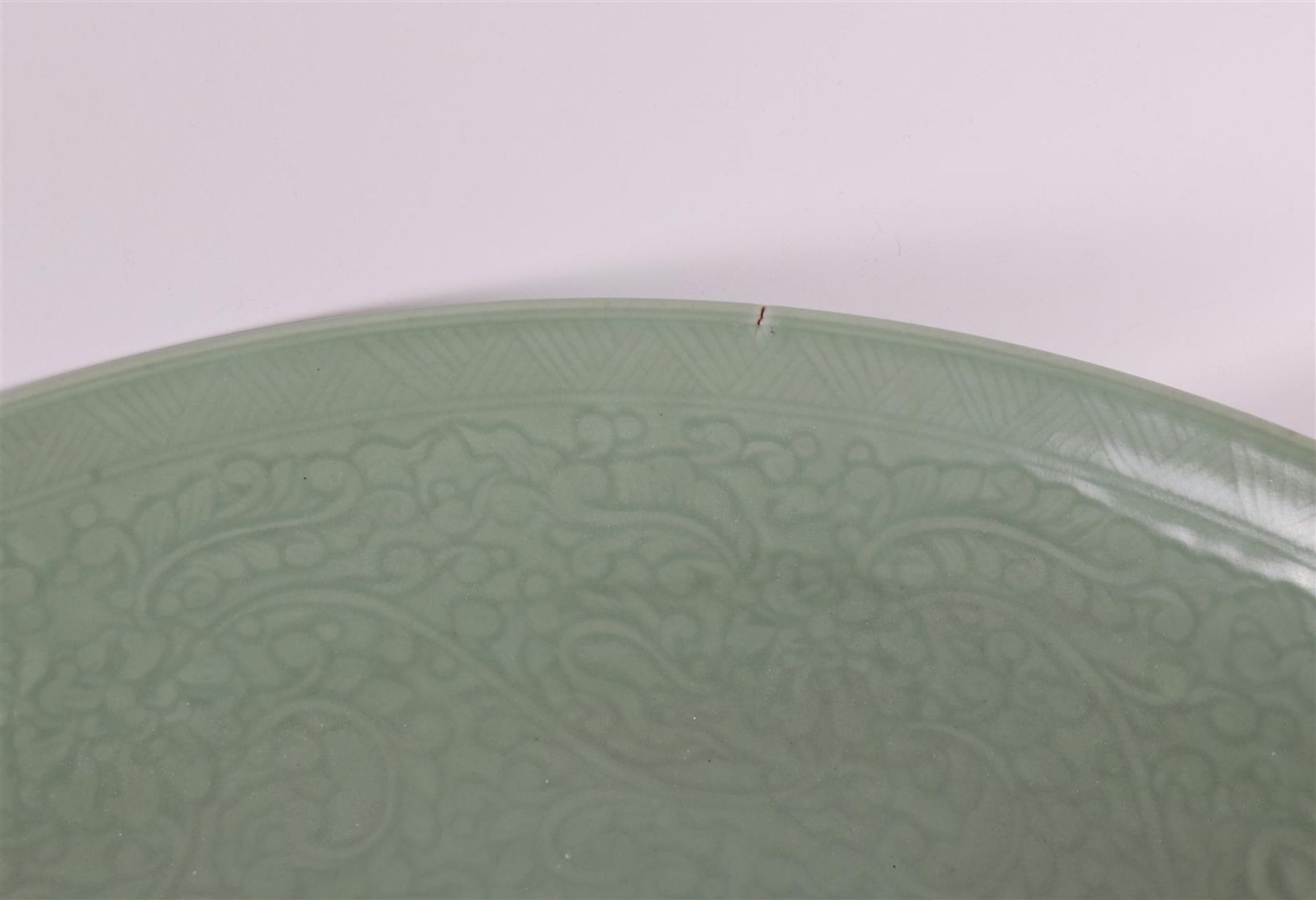A capital celadon porcelain dish, China, after Ming, of later date. - Image 3 of 5