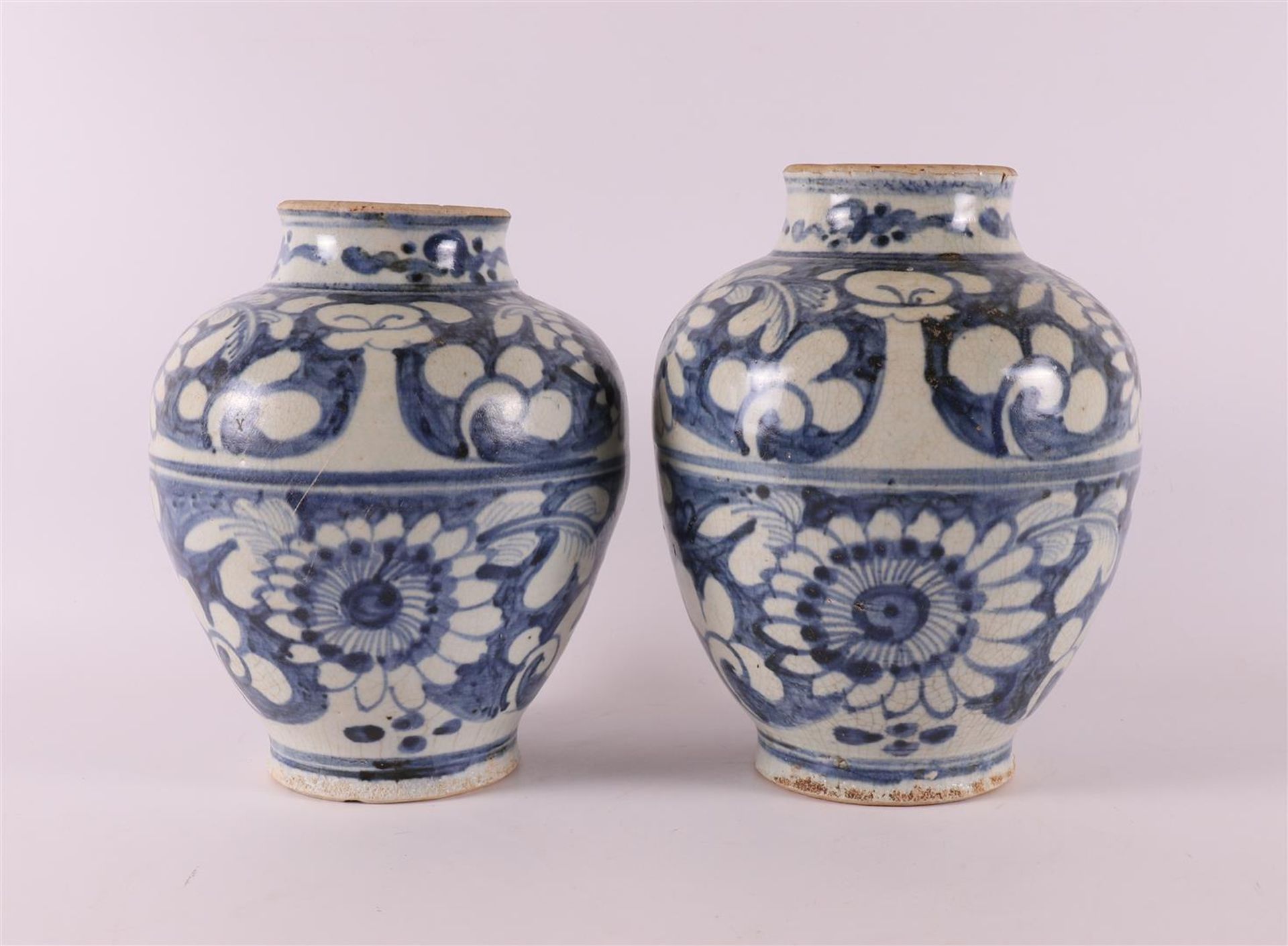 A pair of blue and white baluster-shaped porcelain Swatow vases, China, 17th/18t