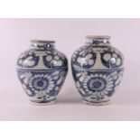 A pair of blue and white baluster-shaped porcelain Swatow vases, China, 17th/18t