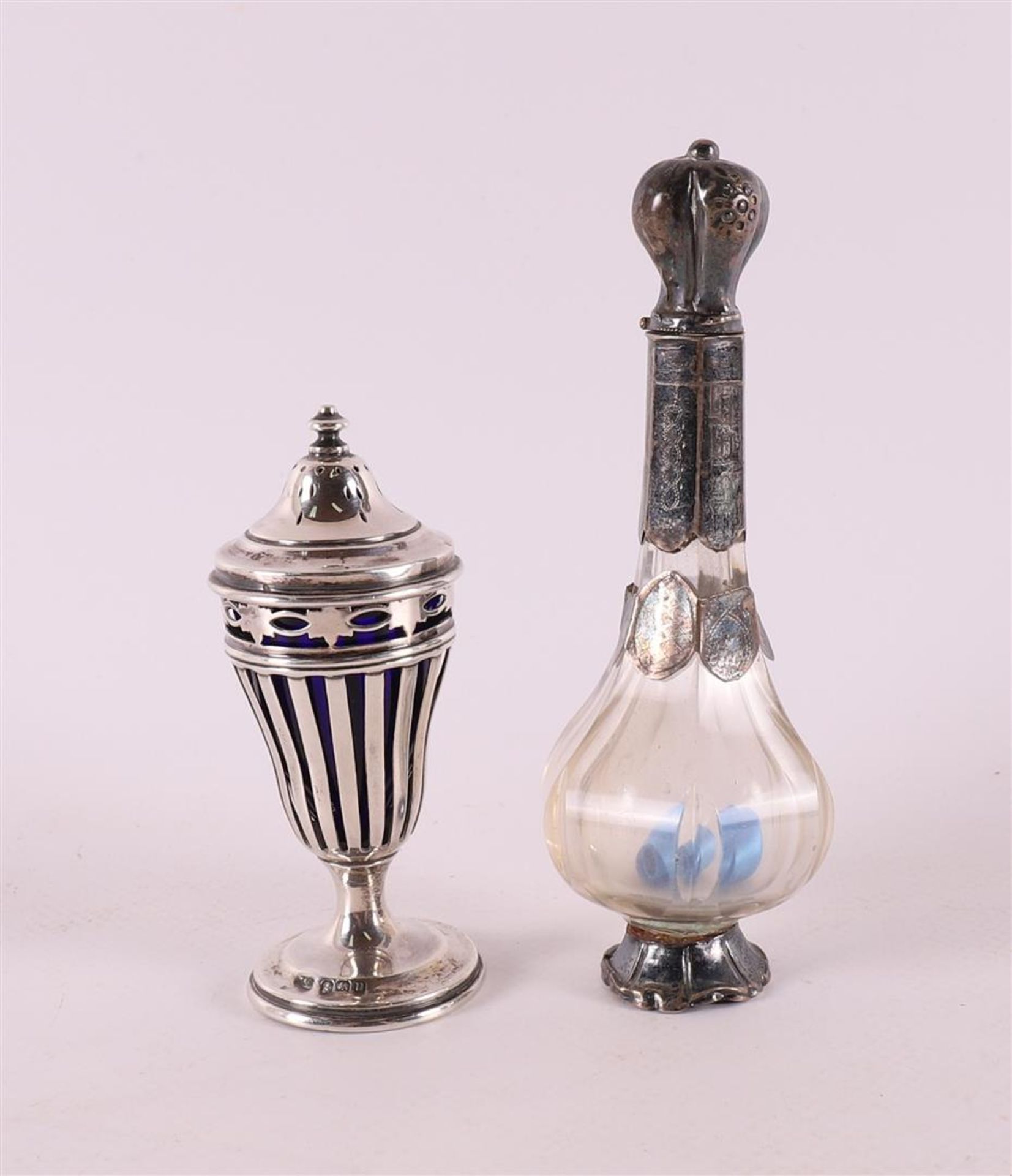 A clear crystal fragrance flask with silver mounting, including stopper, 19th ce