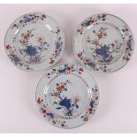 A series of three famille rose porcelain plates, China, 18th century.