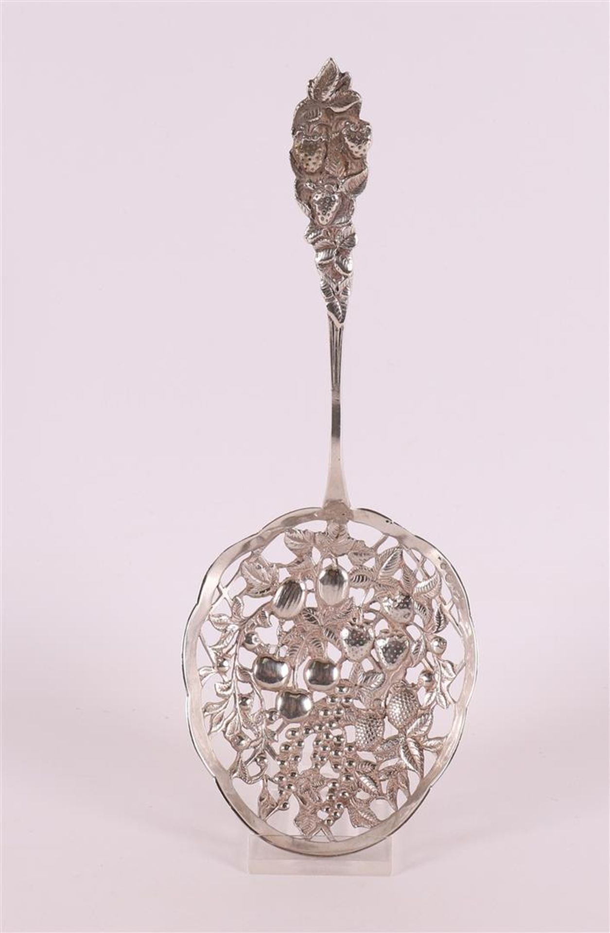 A second grade silver sugar sprinkle spoon, floral decoration, year stamp 1937.