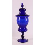 A blue glass apothecary jar, presumably France, around 1900.