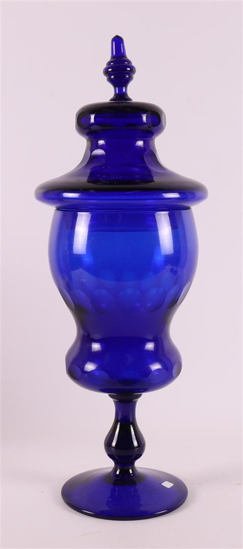 A blue glass apothecary jar, presumably France, around 1900.