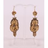 A pair of 14 kt gold earrings with cornucopia, 19th century regional costume.
