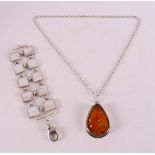 A silver vintage necklace with amber pendant + ditto bracelet, 20th century.