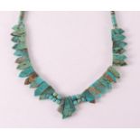 A turquoise necklace.