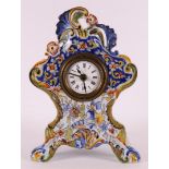 A polychrome Quimper earthenware mantel clock in Louis XV style, circa 1900.
