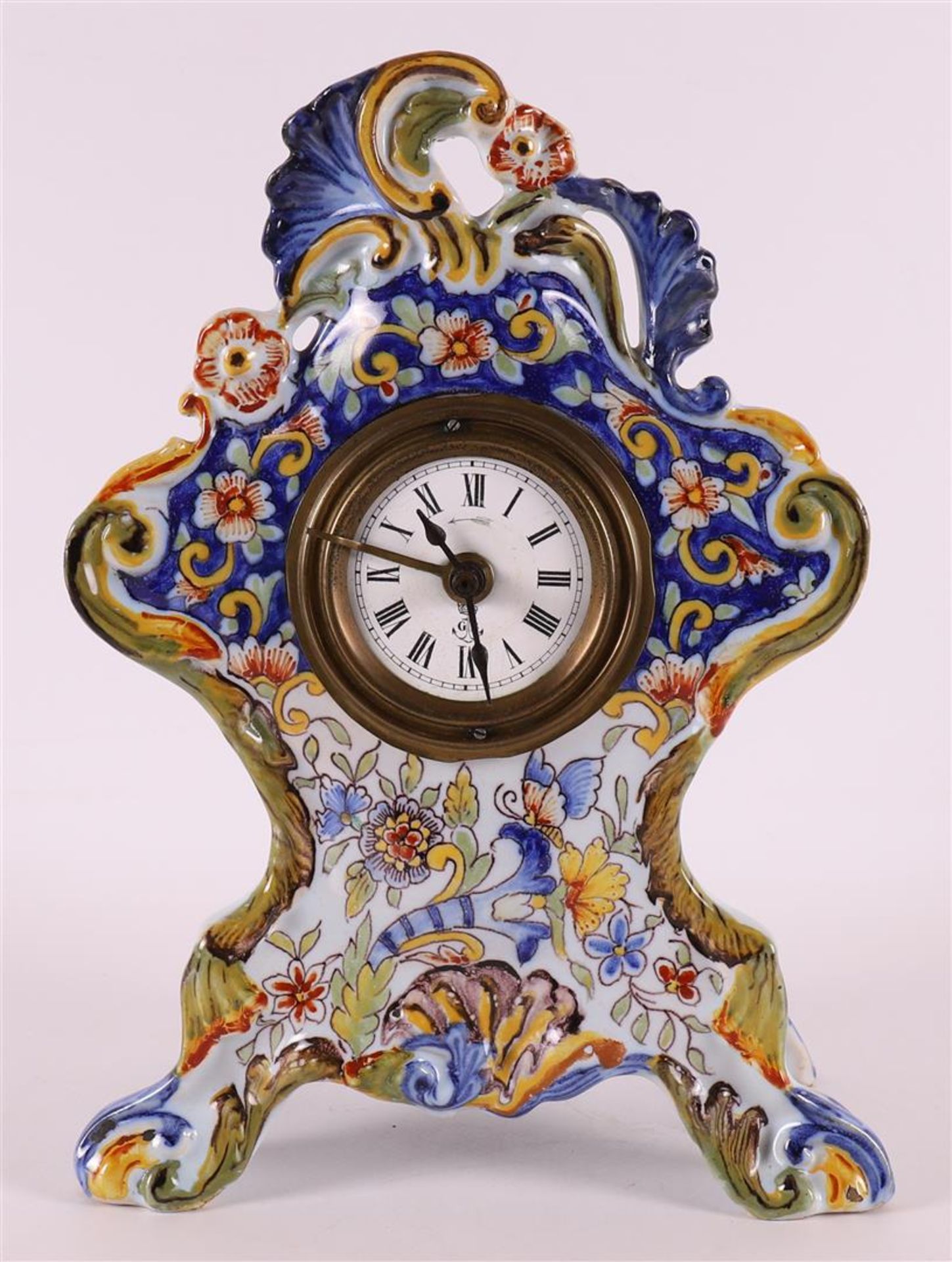 A polychrome Quimper earthenware mantel clock in Louis XV style, circa 1900.