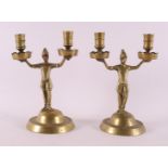 A pair of bronze so-called knight candlesticks, after an antique example.