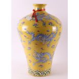 An imperial yellow porcelain baluster vase, antique example Jiaqing.