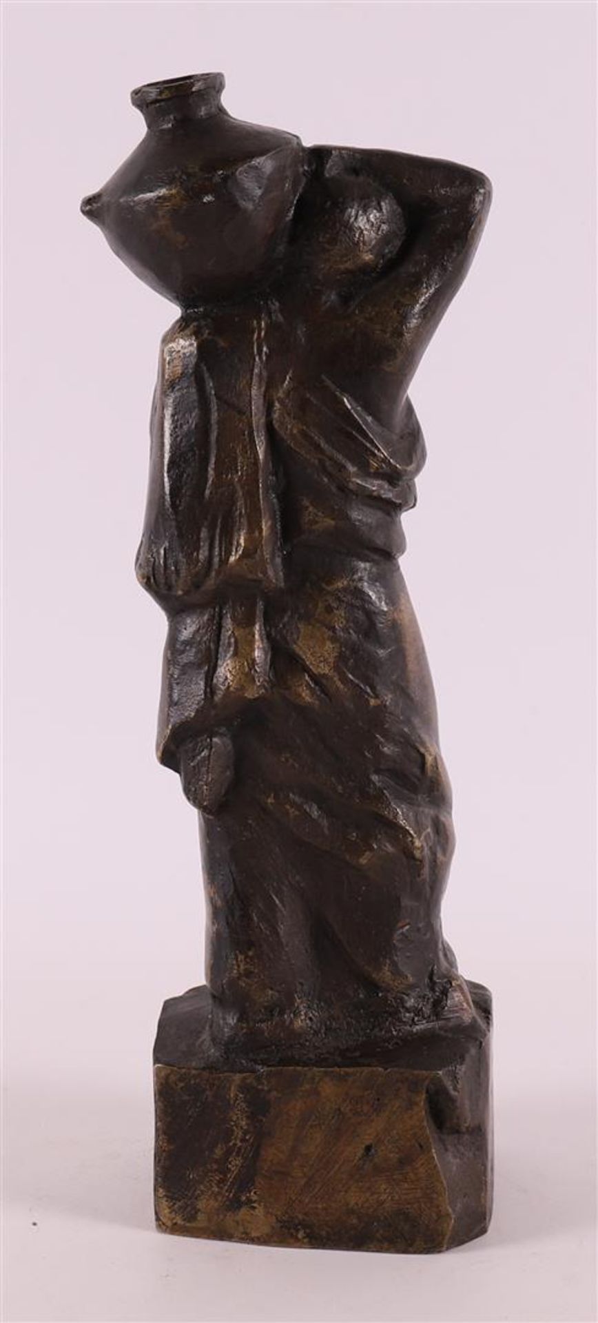 A brown patinated bronze Roman/Greek woman with jug on her shoulder. - Image 2 of 2