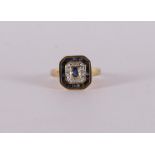 An 18 kt gold ring with facet cut blue sapphires and brilliants.