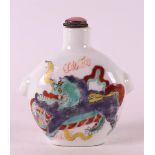 A porcelain snuff bottle, China, 1st half 20th century.