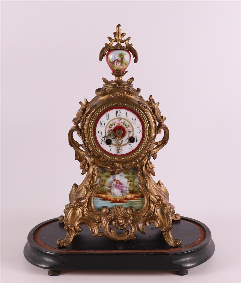 A gilded white metal mantel clock under a glass bell jar, France, 19th century. - Image 2 of 5